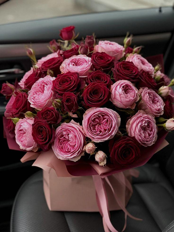 Corporate meeting room with carefully timed floral arrangements that maintain elegance throughout business hours